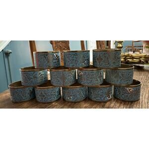 Set of Four Chinese Enamel Cloisonne Napkin Rings Floral and Foliate Brass Decor